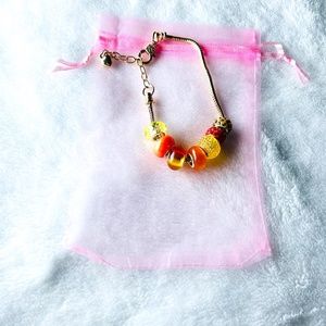 European Style Charm Bracelet with Orange and Yellow Beads